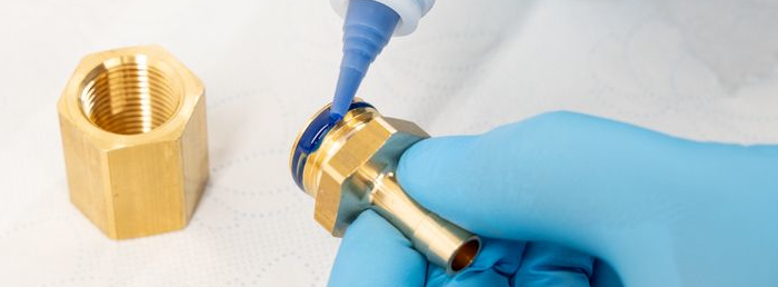 Blue threadlocker applied on the thread